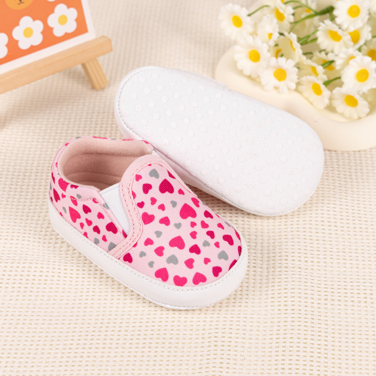 Heart printed slip on baby shoes. CG5165