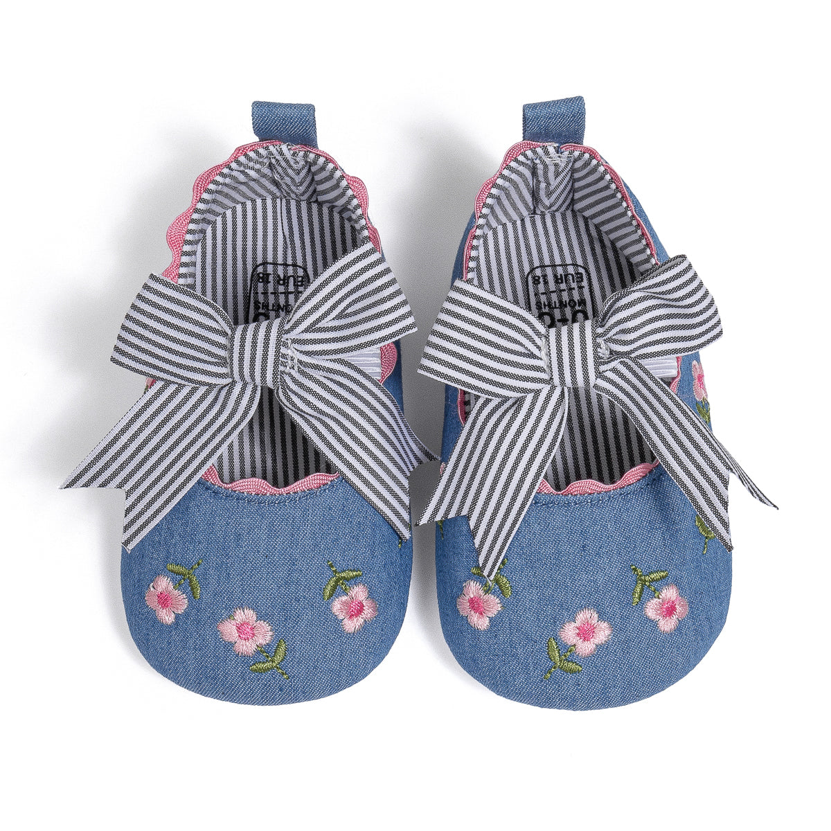 Embroidered girls baby shoes with front bow.