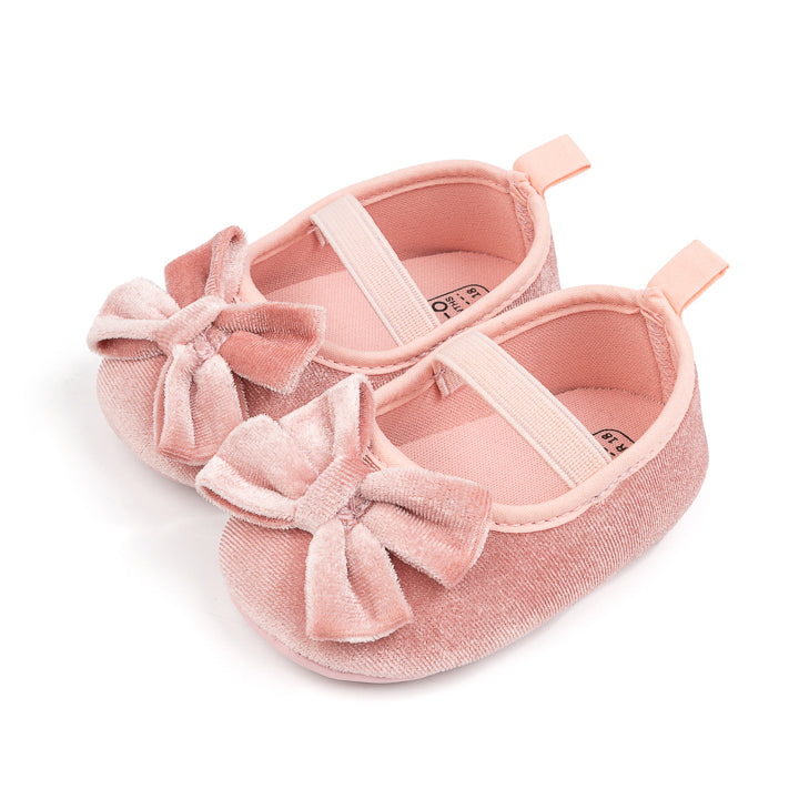 Front Bow velvety baby shoes, available in black and pink.