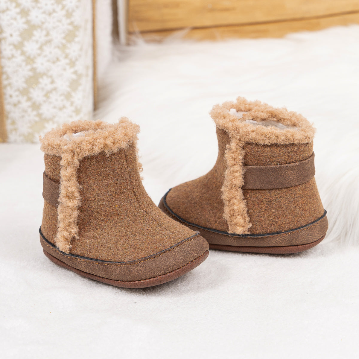 Brown faux fur baby boots. CG5402
