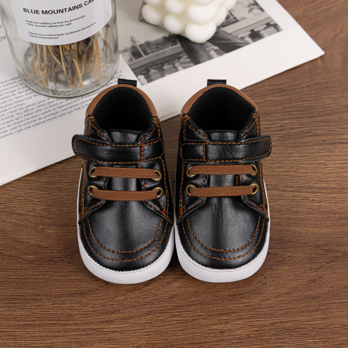 Black leather with brown tone. CG5142