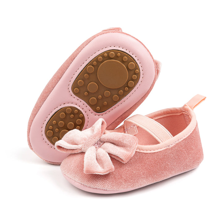 Front Bow velvety baby shoes, available in black and pink.