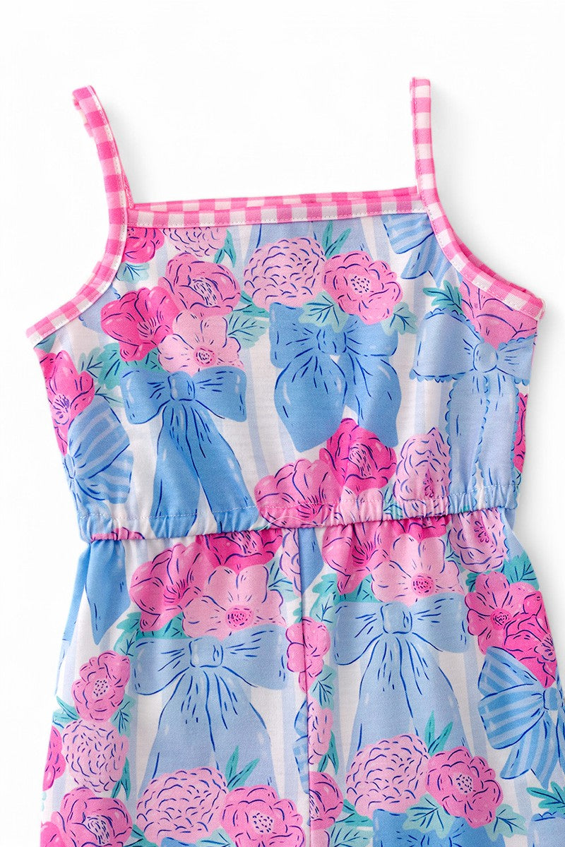 Floral abstract girls jumpsuit with side bows & gingham trim.