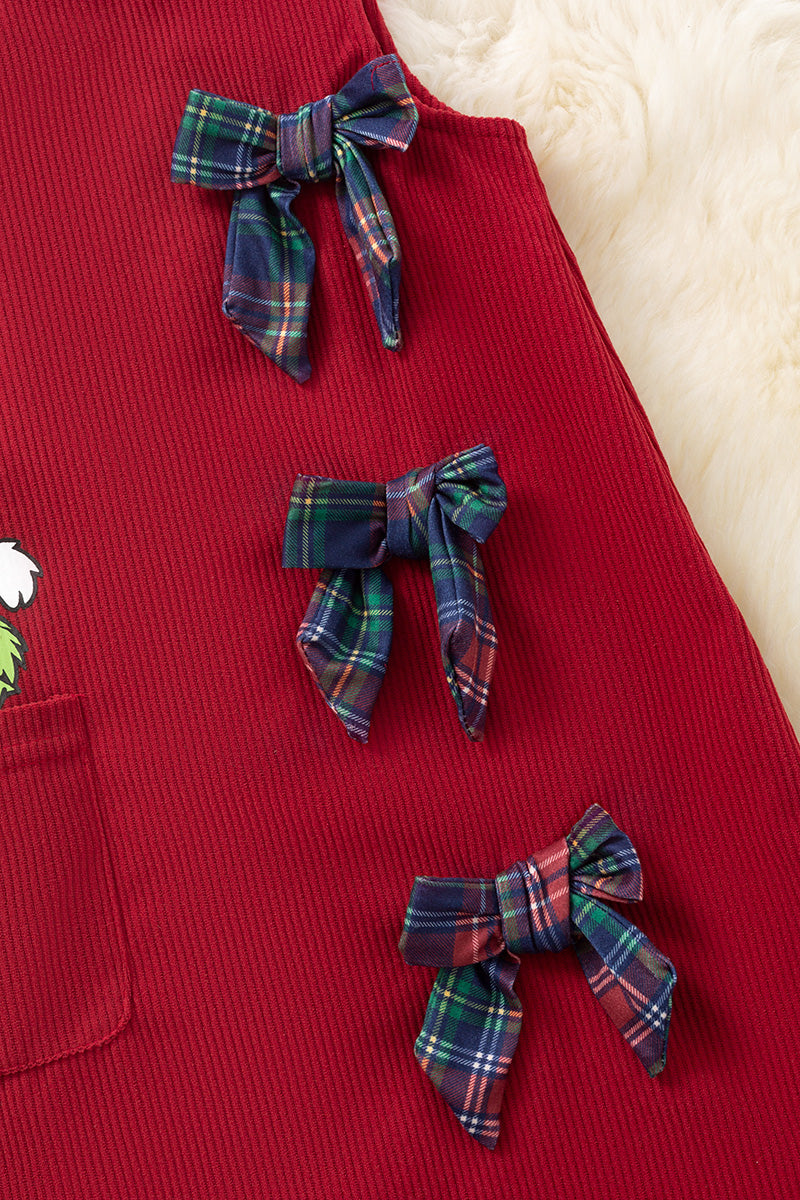 Grinc* corduroy dress with side pocket and bows. DRG52443