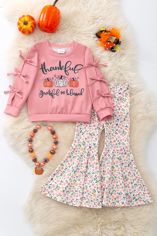 Thankful grateful & blessed" bow sleeve top and floral bell bottoms. OFG51474