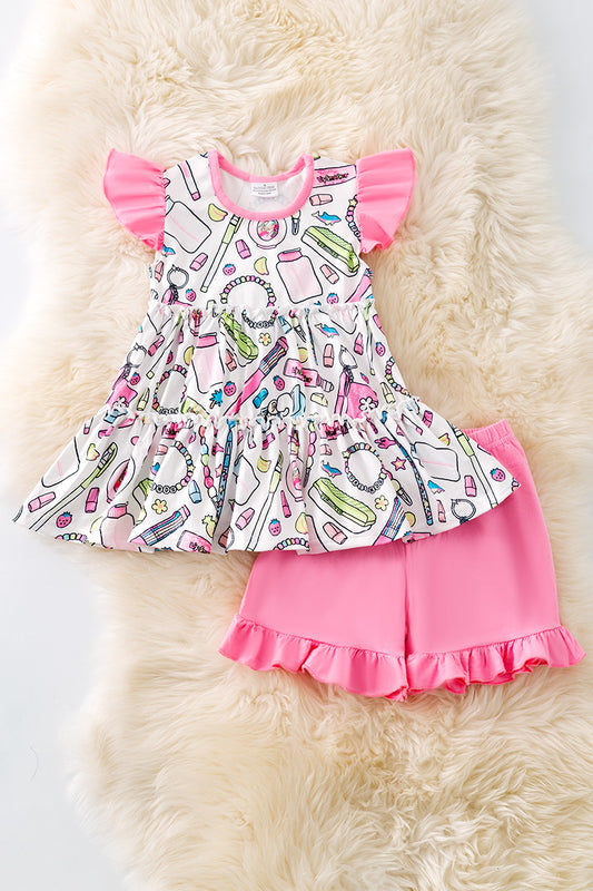 Multi-printed back to school tunic and pink ruffle shorts. OFG50746