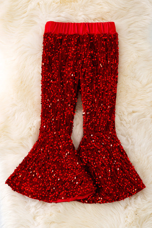 Red bell pants with sequins.