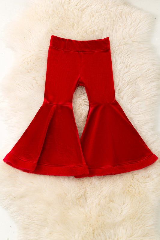 Red soft velvety bell bottoms with faux fur hem.