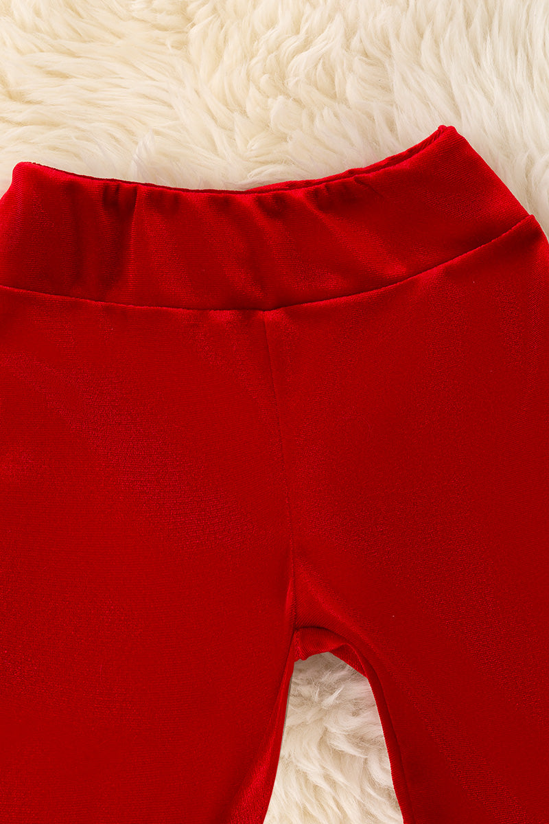 Red soft velvety bell bottoms with faux fur hem.