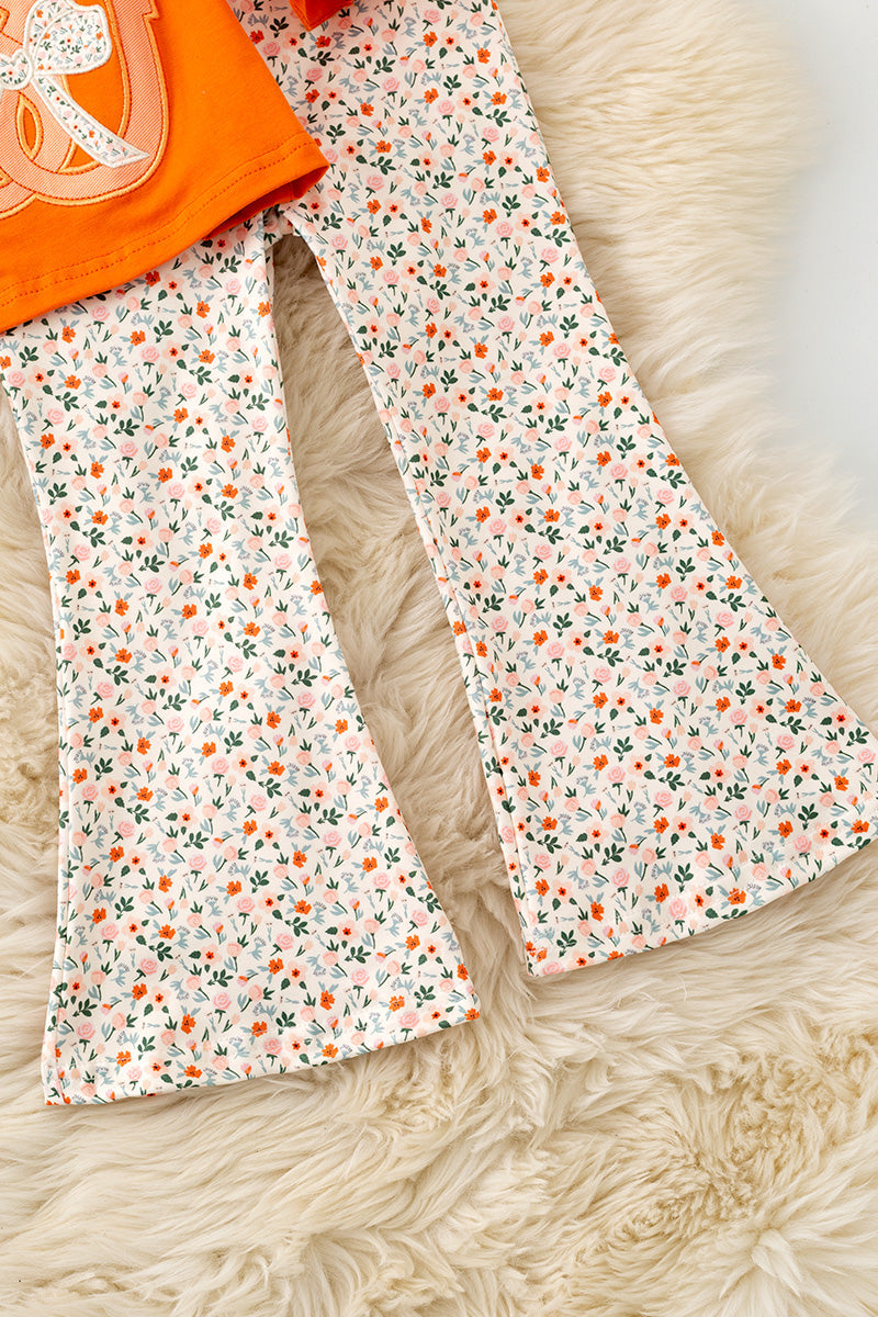 Orange Shoe horse applique tunic and floral pants. OFG61401