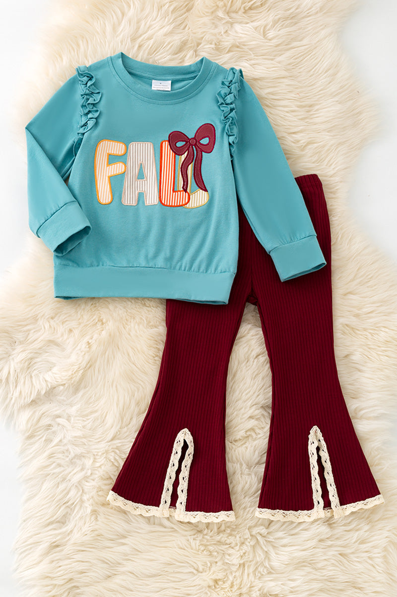 Fall applique on blue sweatshirt with burgundy pants w/open front. OFG61413