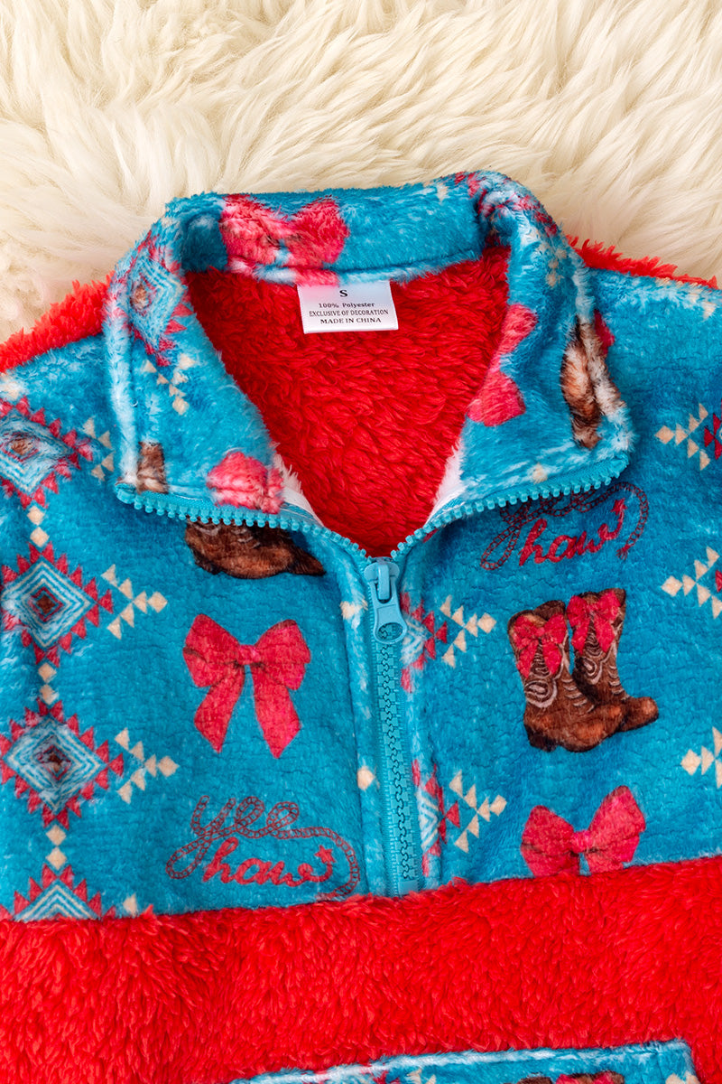 Sherpa Western printed on red pullover sweater.