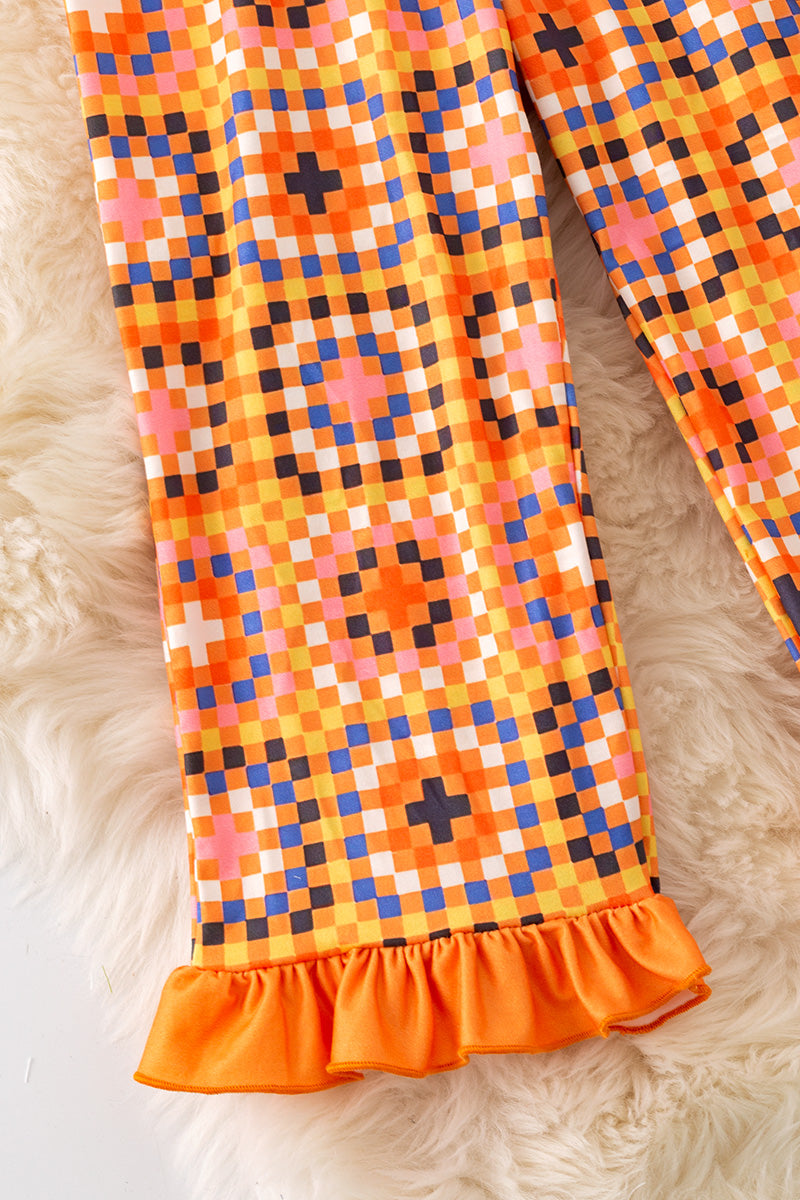 Orange multi-printed pattern printed girls romper. PNG50227