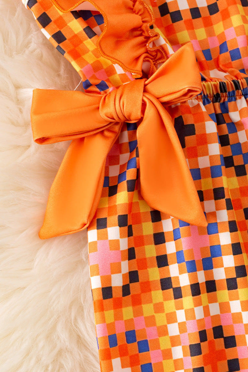 Orange multi-printed pattern printed girls romper. PNG50227