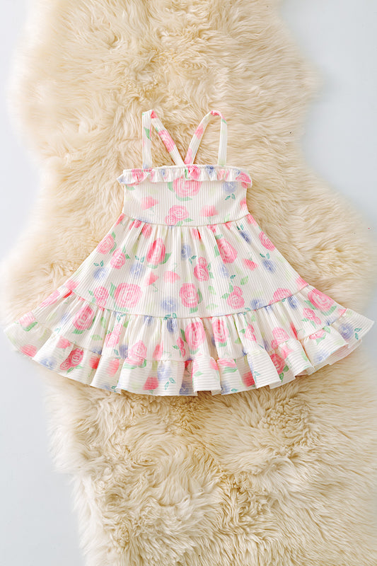 Pink rose printed girls dress with ruffle hem. DRG51353