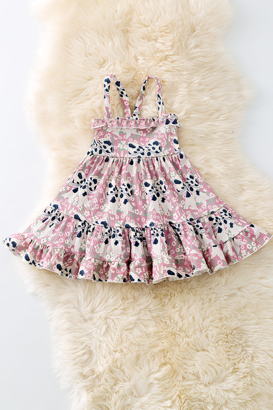 Cow printed coquette bow ruffle dress. DRG51351