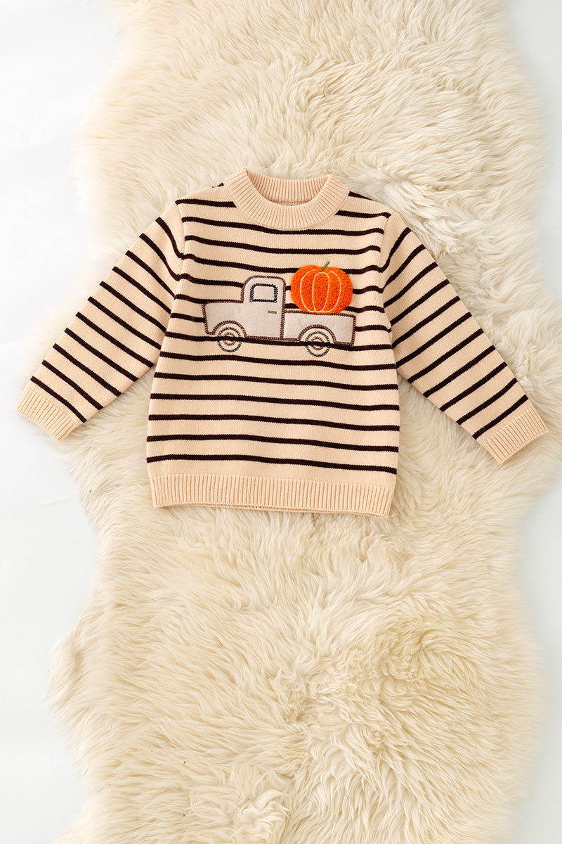 Unisex brown stripe on ivory knit sweater w/ pumpkin on a truck. TPG60458 A-