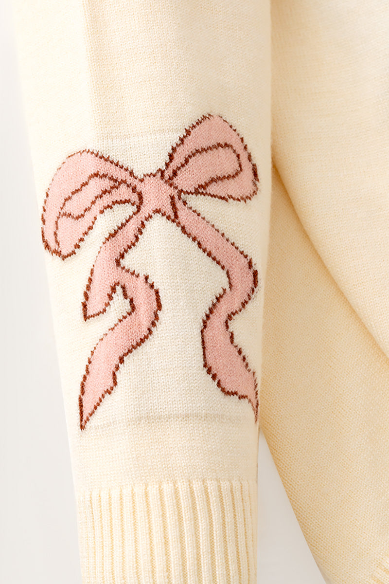 Horseshoe knit sweater w/ pink bow on sleeves. TPG60533 -M-