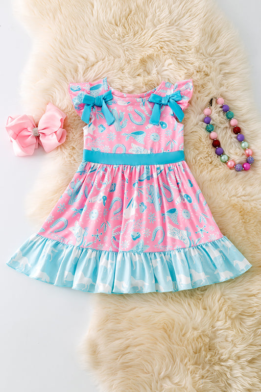 Turquoise and blue western printed girls dress with side bows.
