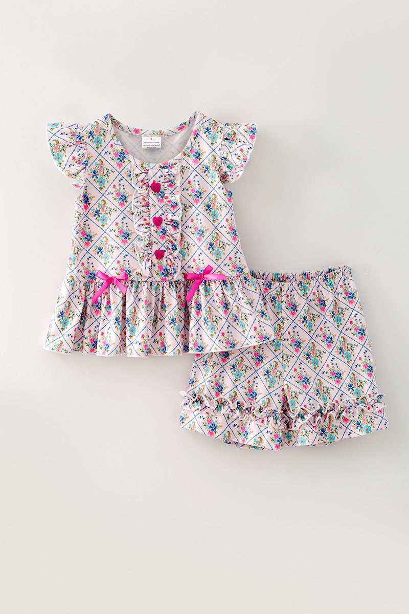 Floral printed w/fuchsia front button and ruffle shorts. OFG62612 -A-