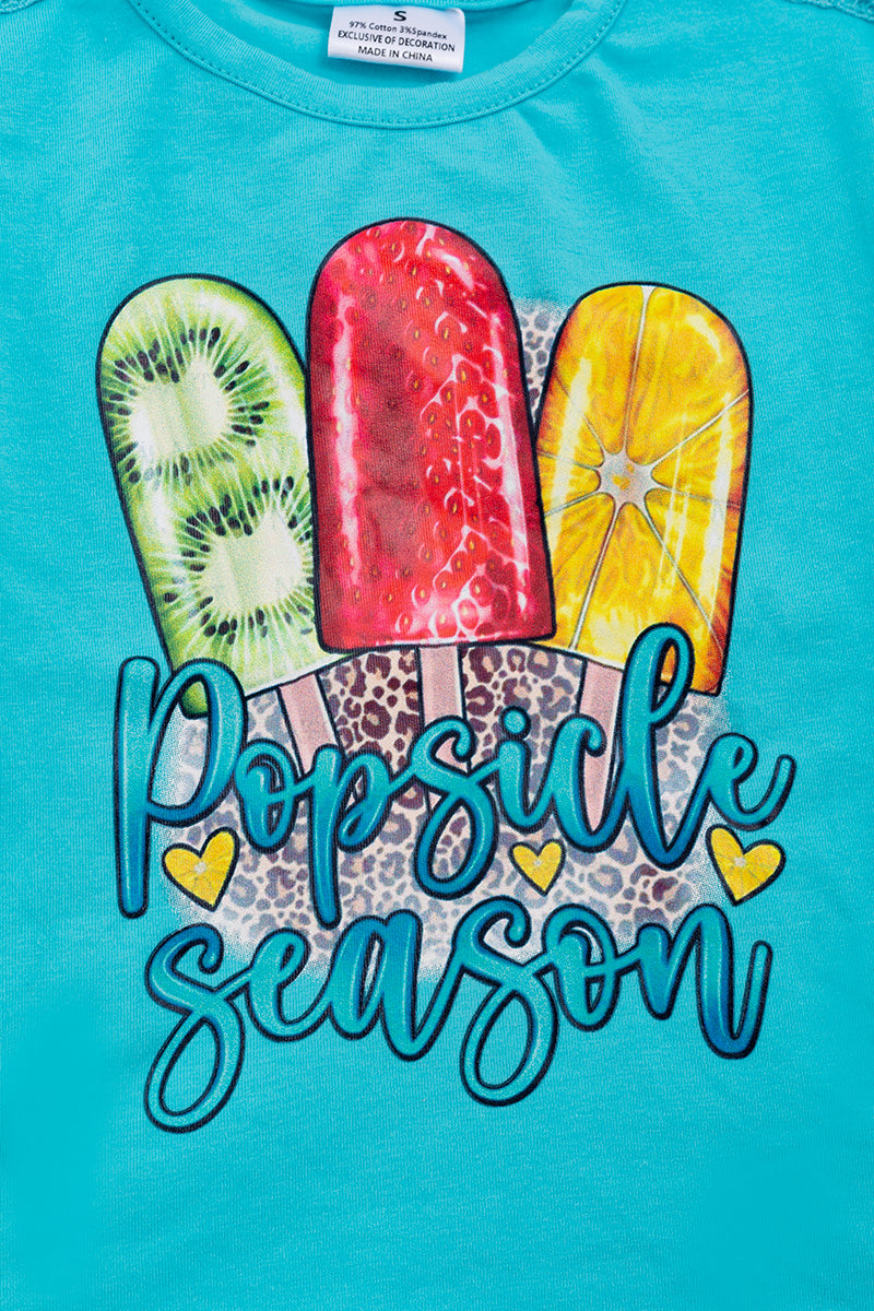 Turquoise "Popsicle Season" graphic tee with embroidered detail on shoulder