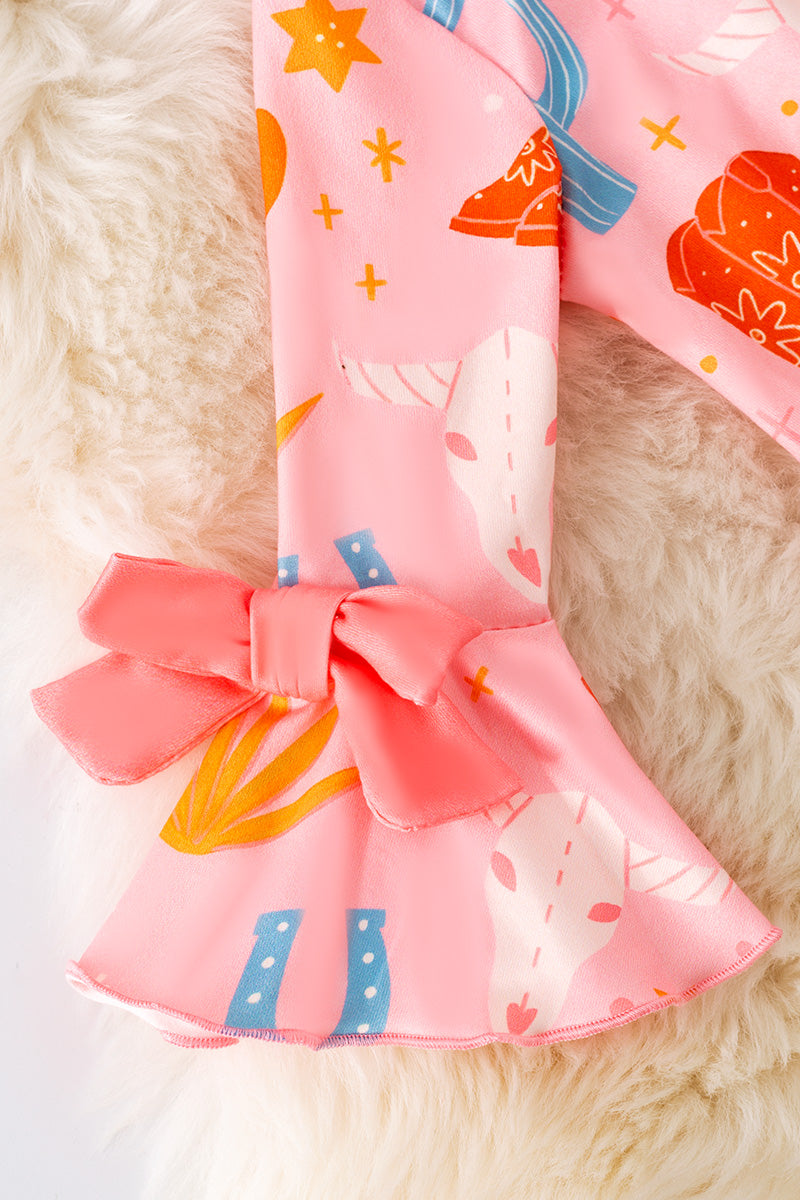 Pink & Orange western printed baby romper w/ruffle hem. RPG51317