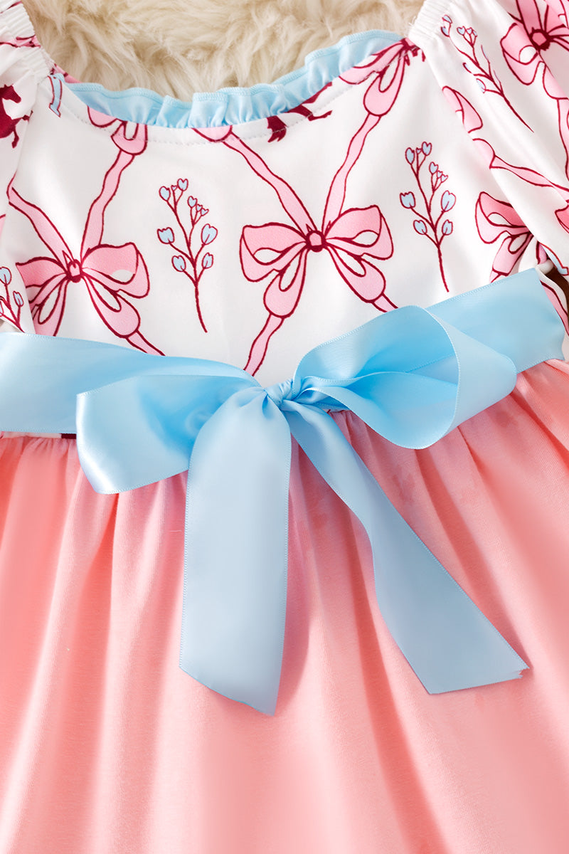 Pink Coquette western ruffle dress with blue front bow. DRG52448