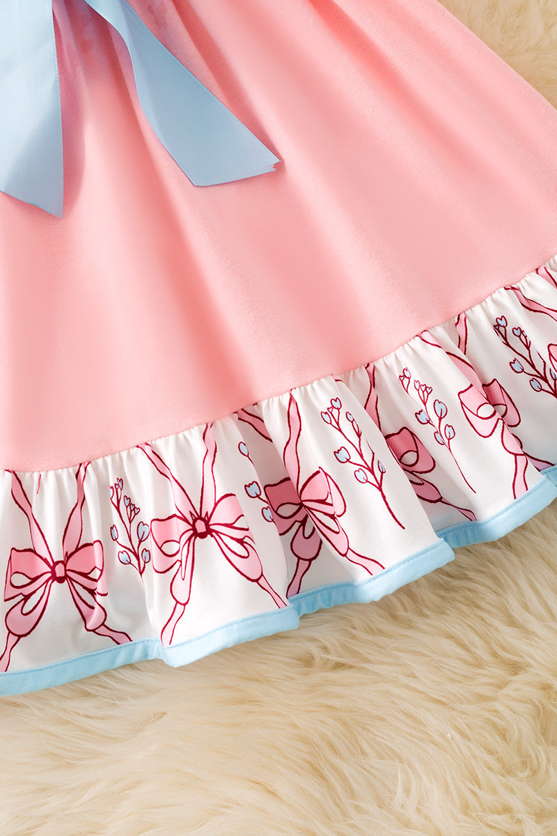 Pink Coquette western ruffle dress with blue front bow. DRG52448