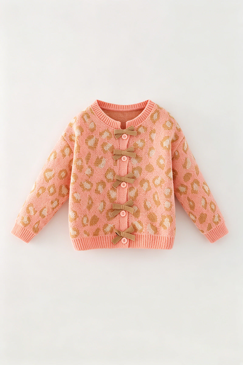 Coral animal print sweater w/front bows. TPG60522