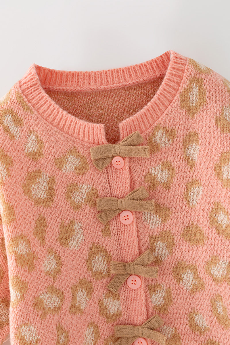 Coral animal print sweater w/front bows. TPG60522