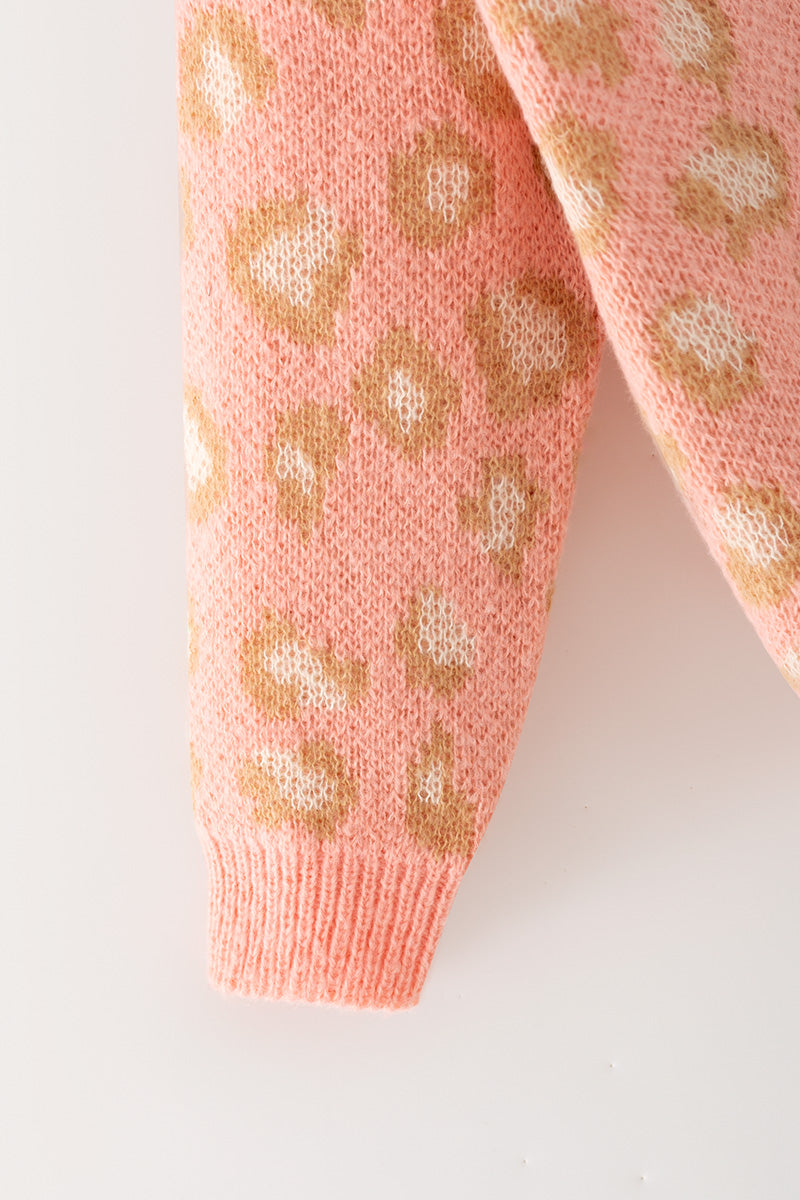 Coral animal print sweater w/front bows. TPG60522
