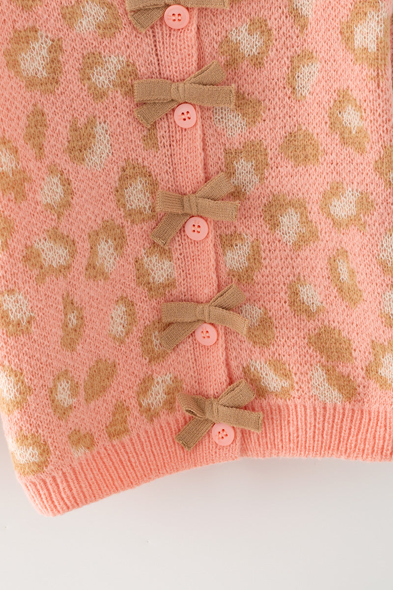 Coral animal print sweater w/front bows. TPG60522