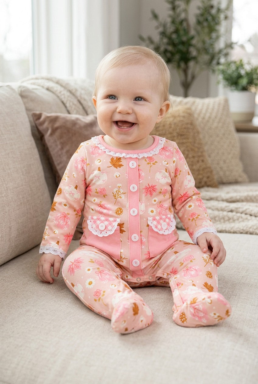 Creamy & pink pumpkin printed baby bodysuit. RPG64147