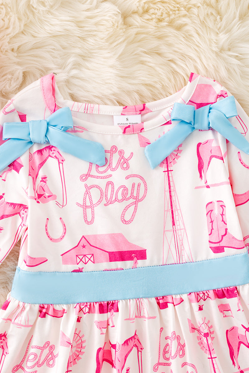 Let's Play" Western printed dress with plaid ruffle trim. DRG52620