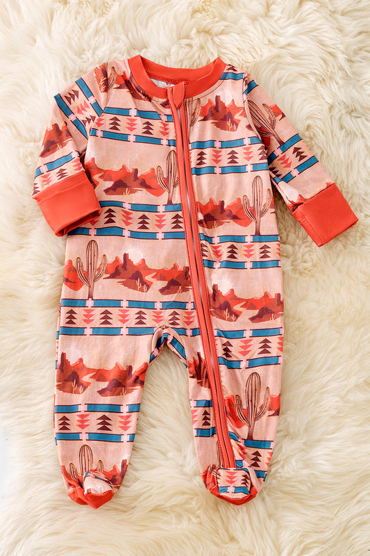 Dessert and aztec printed baby onesie with footie.