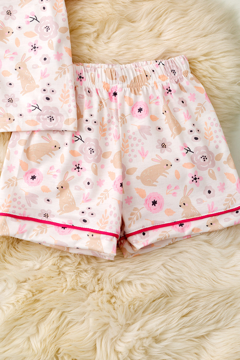 Girls Easter bunny pajamas with fuchsia trim.