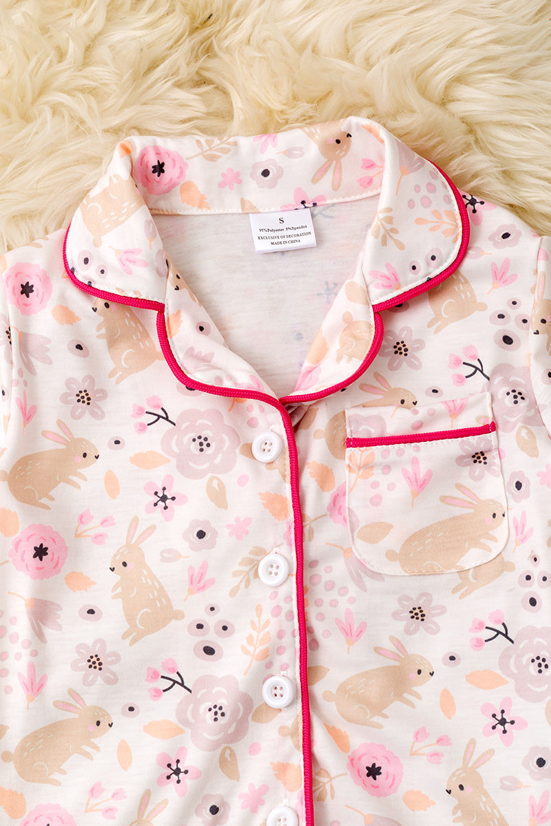 Girls Easter bunny pajamas with fuchsia trim.