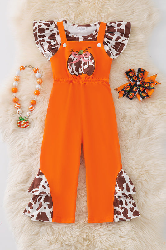 Orange jumpsuit with pumpkin applique and cow printed angel sleeve top.