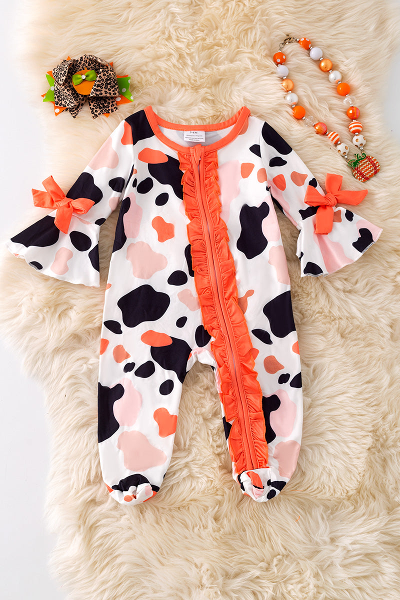 Spotted baby bodysuit with bell sleeves.