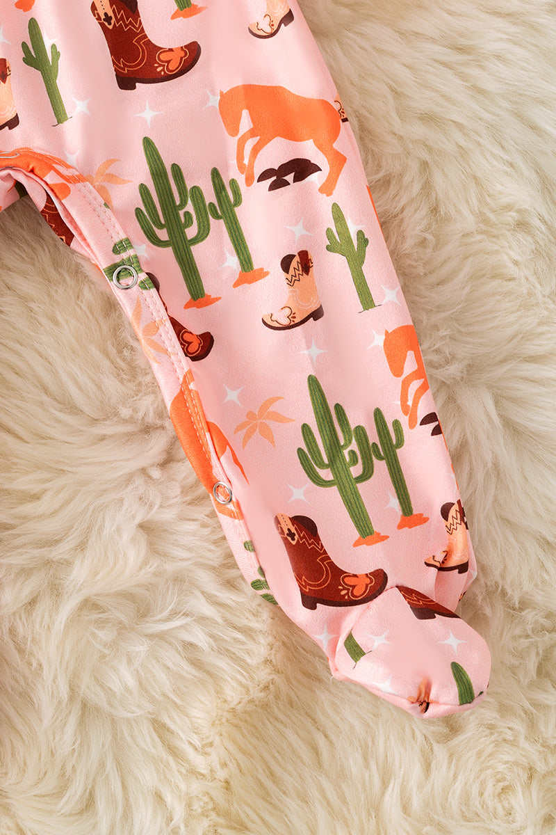 Western boot printed girls onesie with ruffle butt.
