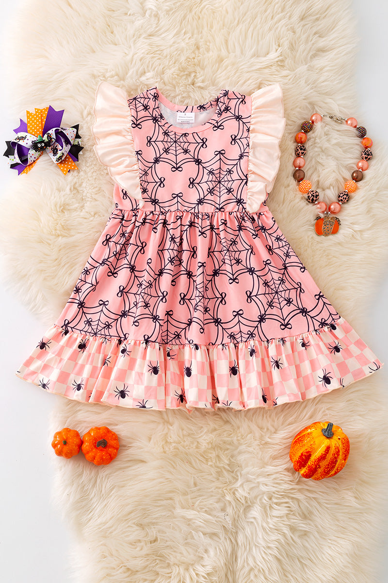 Spider web printed on pink dress with angel sleeves. DRG52034