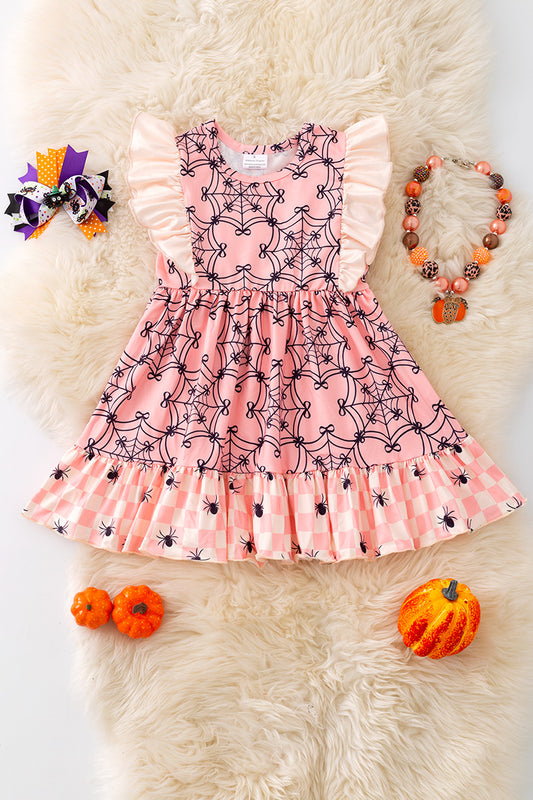 Spider web printed on pink dress with angel sleeves. DRG52034