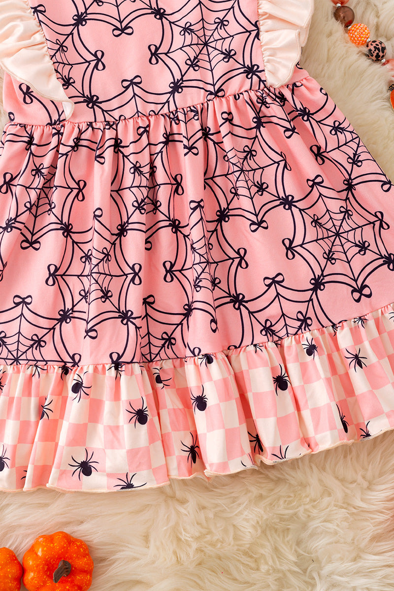 Spider web printed on pink dress with angel sleeves. DRG52034