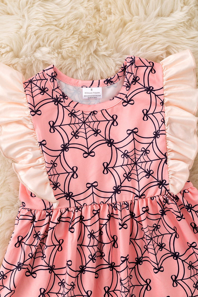 Spider web printed on pink dress with angel sleeves. DRG52034