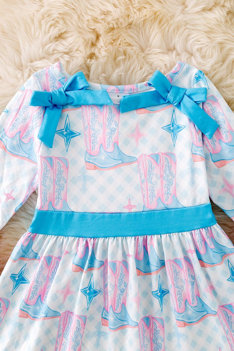 Cowgirl boot printed girls dress with cow printed ruffle hem. DRG53440