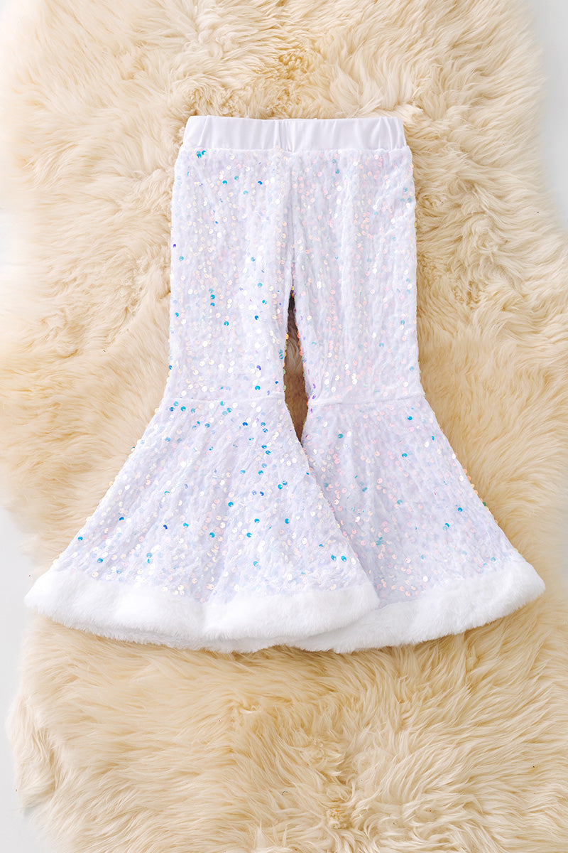 White sequins bell bottoms with fur trim. PNG50265