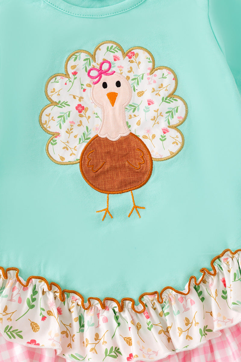 Mink Thanksgiving ruffle layered tunic and floral leggings. OFG51481