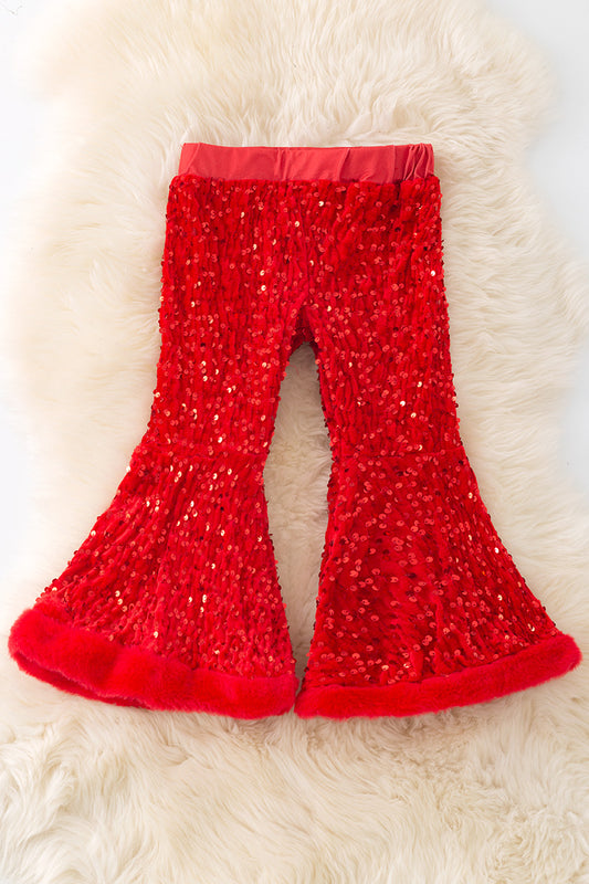 Red sequins bell bottoms with faux fur trim. PNG50267