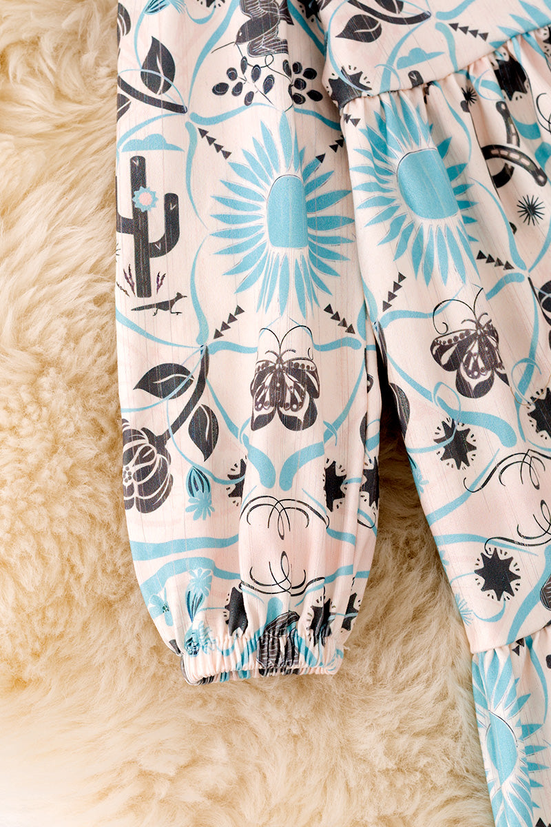 Aqua floral printed girl tiered dress.