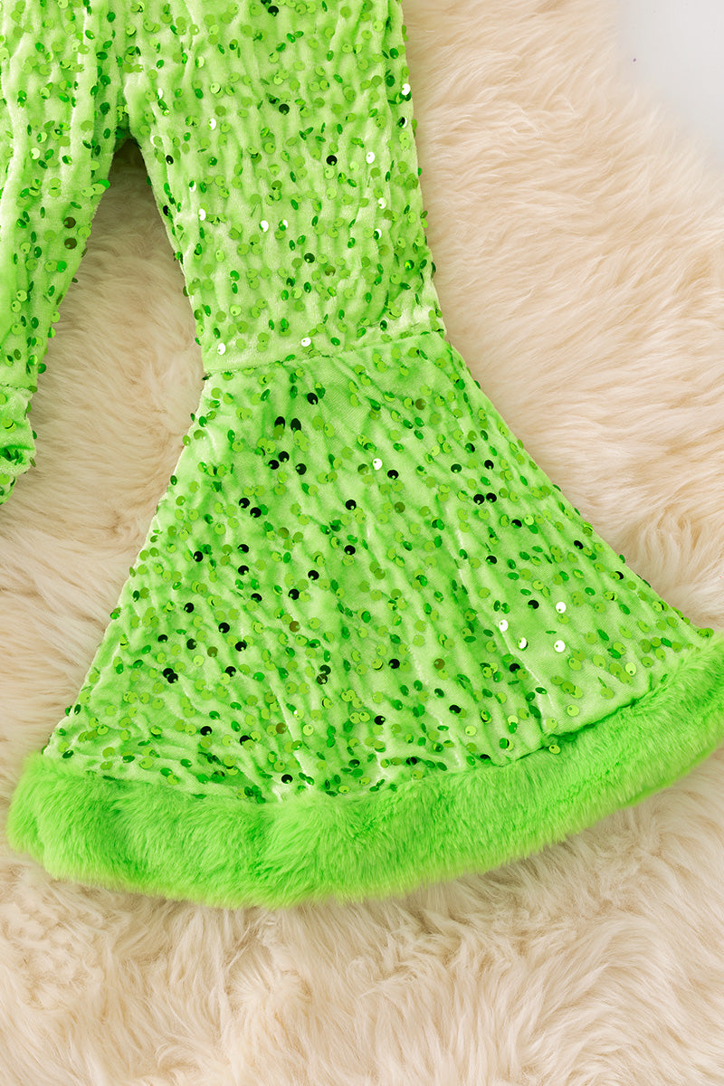Neon green sequins bell bottoms with faux fur hem.
